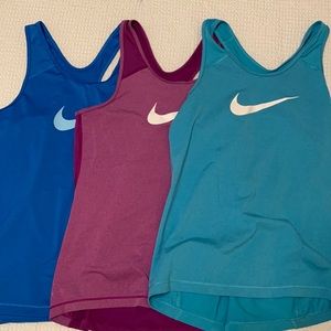Girls Nike XL tank tops (3 pack) teal, royal blue, magenta/purply pink